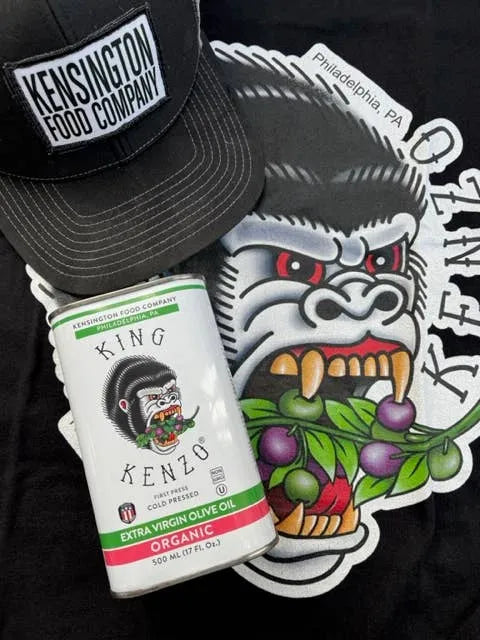 King Kenzo organic olive oil can with Kensington Food Company cap and gorilla graphic on black background