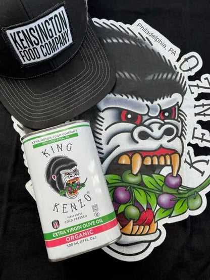 King Kenzo organic olive oil can with Kensington Food Company cap and gorilla graphic on black background