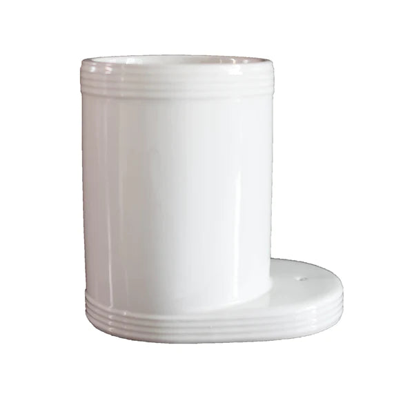 White ceramic Nora Fleming utensil holder with smooth finish and a side handle for kitchen organization