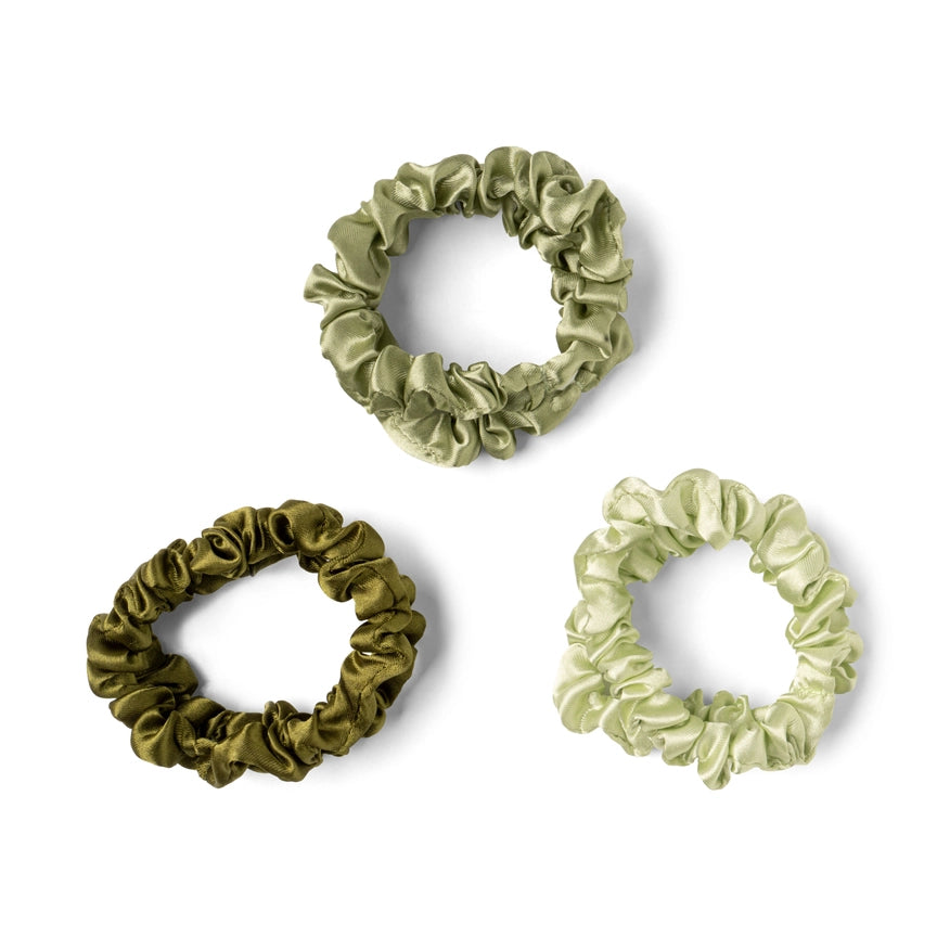 Three satin scrunchies in shades of green for gentle hair styling by DM Merchandising